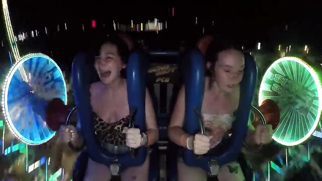 A girl is having fun in a slingshot bikini and slips out of it