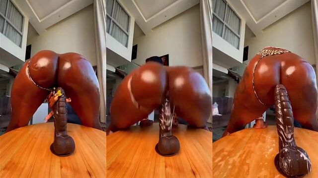 A woman plays with a dildo and squirts from her creamy pussy