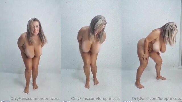 A sexy MILF with huge boobs gets fucked by a dildo