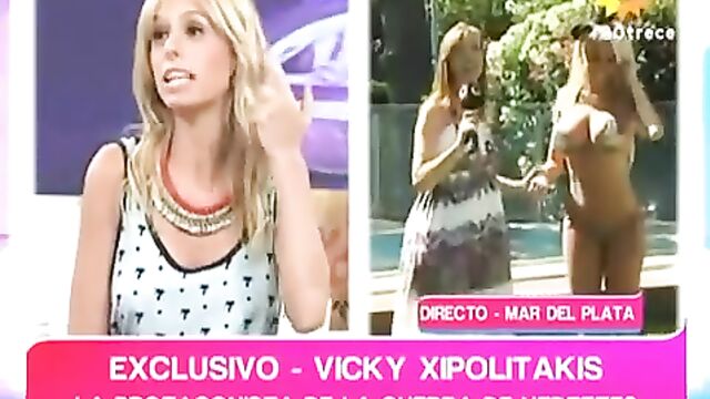 Hot Latina Vicky Hermanda does a sensual strip on an open TV program