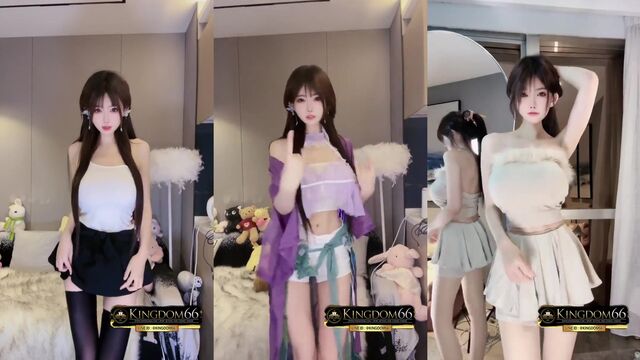 Cute Asian girl dancing sexy in the bedroom