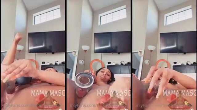 Ebony babe with huge boobs gets her pussy wet with a vibrator