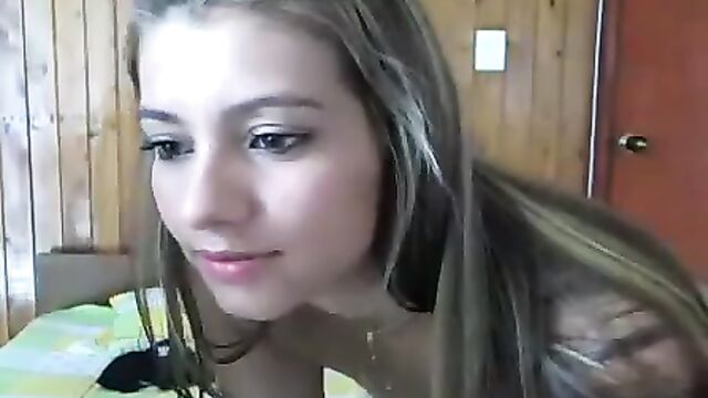 A hot Latina girl is showing her body on the webcam