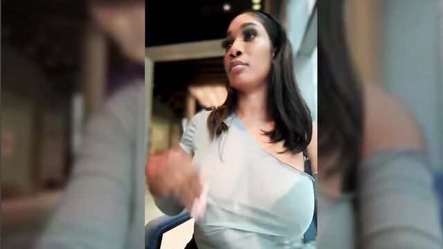Ebony Latina with big tits shows her pussy in the city square