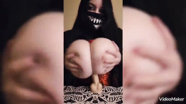 Busty Asian beauty EssKawaiiWu performs a captivating titty drop act