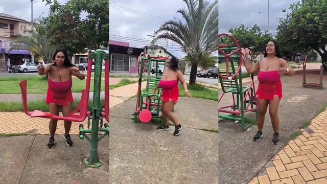 A fat black woman has huge natural boobs that leak when they get wet