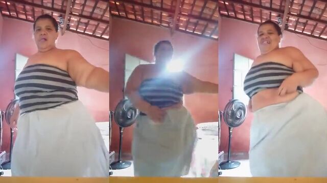 Fat granny takes off her panties and shows her ass during a phone call