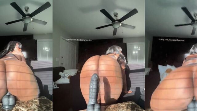 Ebony beauty with big ass rides a big dildo