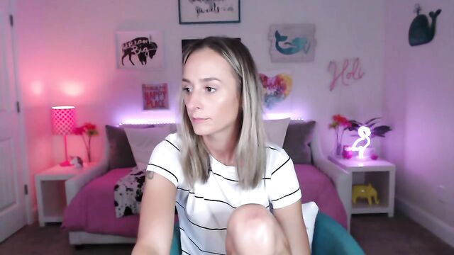 A very skinny teen shows off her hot flat stomach and small body