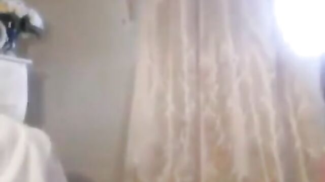 A new girl is showing herself in the bathroom