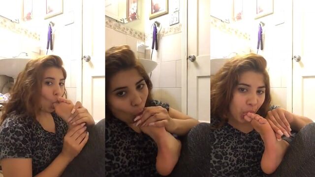Foot-fetishistic self-pleasure with soles licking and toe sucking