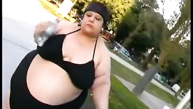 Busty SSBBW gets her fat belly rubbed and stroked