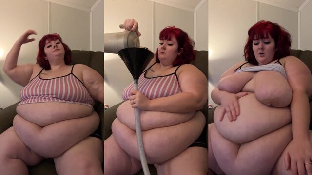 An SSBBW gets her belly worshiped and stuffed with food in a steamy scene