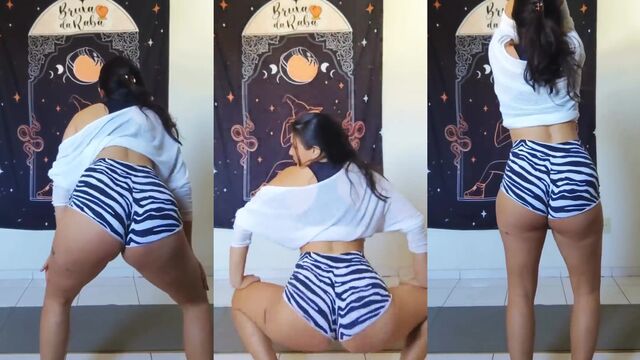 Morena gostosa rebolando com shortinho atolado na bunda