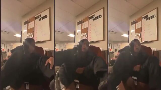 An ebony beauty fingers her pussy at work and gets caught on camera