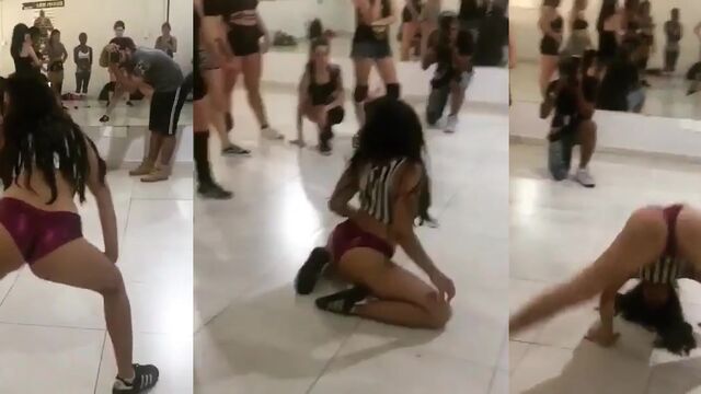 The hot brunette girl is dancing and showing her sexy ass