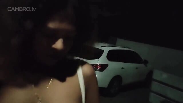 A sexy girl is walking on the street without any clothes