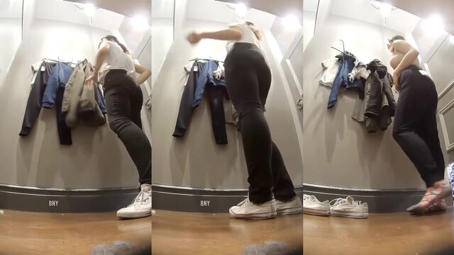 A Chinese woman tries on clothes and has sex in the fitting room