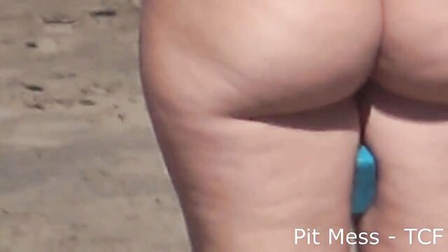 Blonde pawg in sexy bikini on the beach