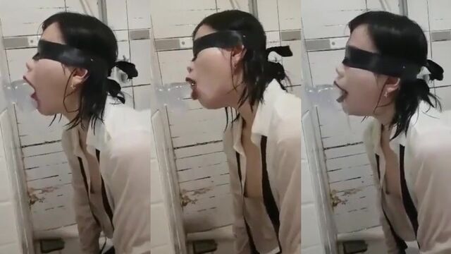 Hot Asian slut gags on a big dildo, mirroring her favorite scene