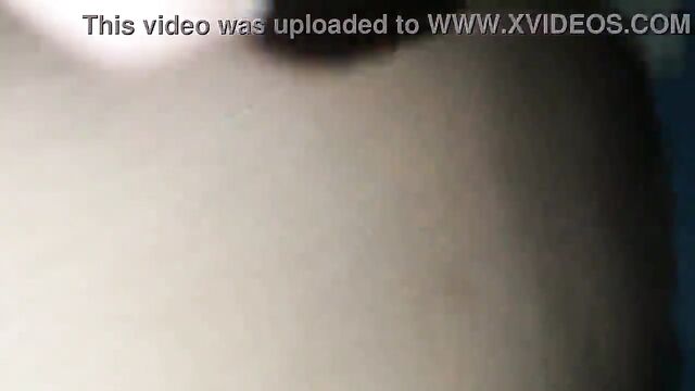 A mature woman is screaming with orgasm on a sybian machine