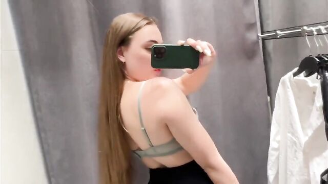 Trying on a see-through dress with a butt plug from HubOfCandy