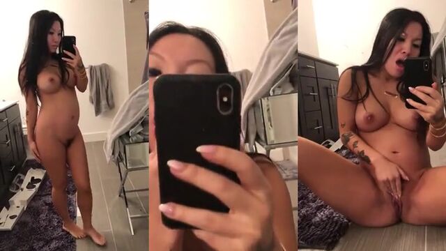 Sexy Japanese beauty Asa Akira shows off her big boobs in stockings