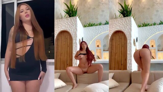 A sexy girl was photographed naked with her beautiful ass