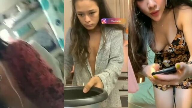An Asian girl has a nip slip accident, not wearing a bra