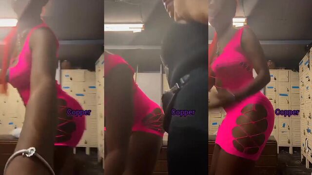 A hot guy shows his muscles in the gym locker room