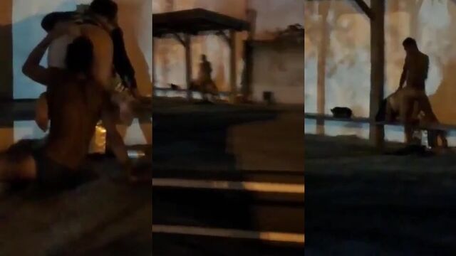 Drunk couple making love on the street