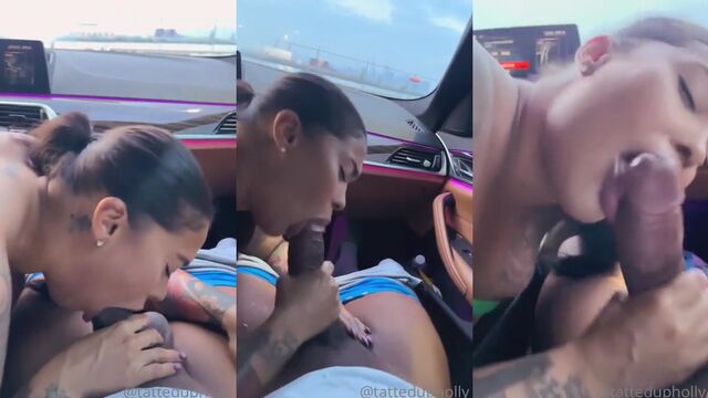 Redhead gives an amazing blowjob while driving on the road