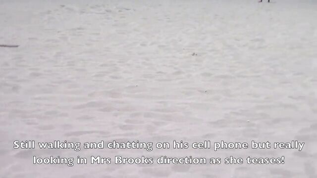 Nikki Brooks is having fun with someone at the beach