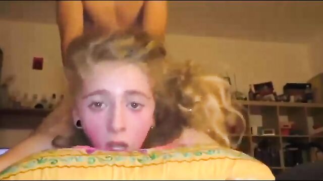 Two young girls are having fun with each other in a naughty way