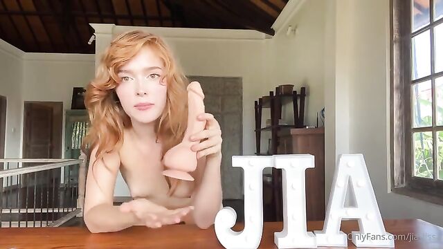 Redhead hottie Jia Lissa enjoys hardcore sex in an intense scene
