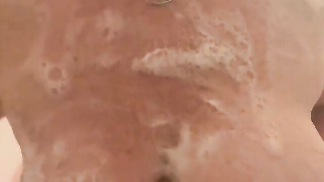 Hot and sexy shower with soap and wet titties