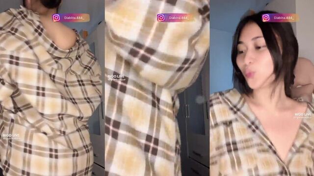A sexy girl performs on camera for her fans on Bigo