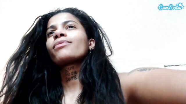 A beautiful girl with huge boobs shows them off while camming online