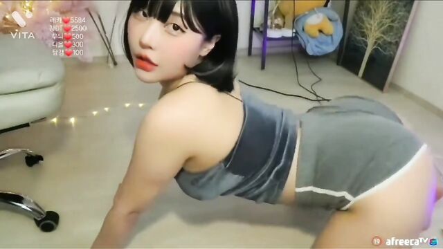 A thick Korean girl shows her amazing BJ skills by sucking a cock
