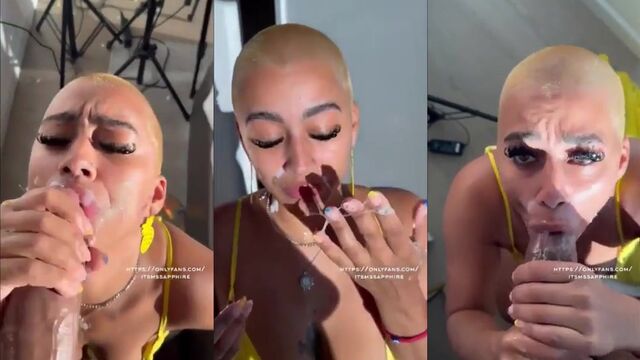 Ebony girl gets on her knees to receive a cumshot