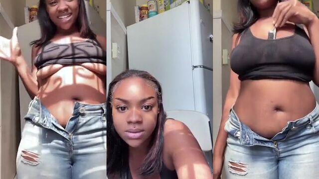 Black slut Akira Babi shows her holes while teasing with a cute face