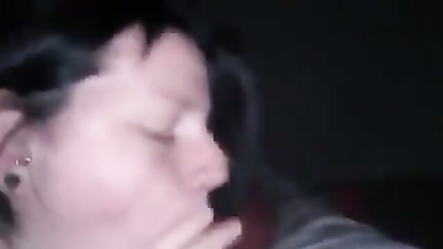 A mature woman performs an intense blowjob and receives a cumshot in her mouth