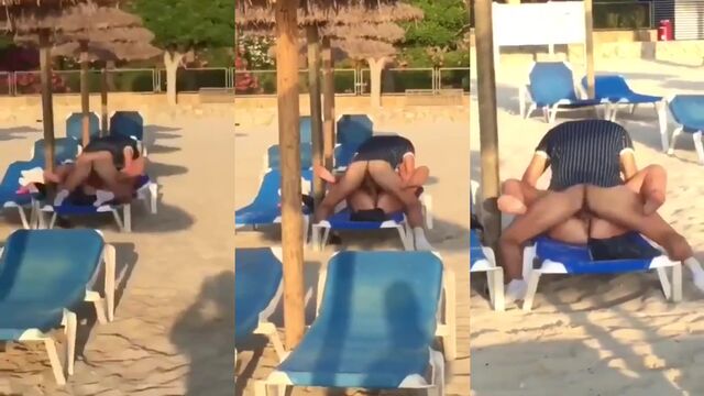 A couple has sex right on the public beach in front of passers-by