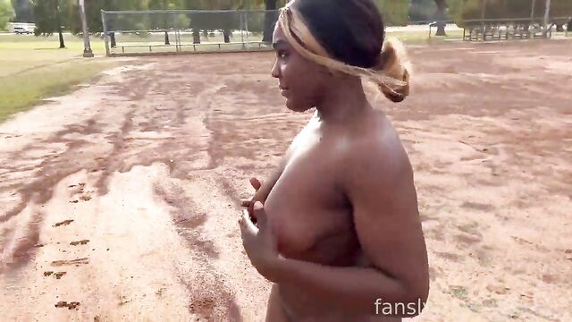 A woman with a big ass is exposing herself in public