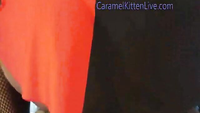 Girl with caramel-colored hair has sex on a web camera
