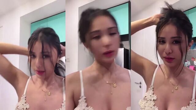 A sexy girl shows her big boobs while doing housework on Bigo