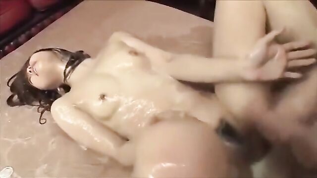 Hot Japanese woman enjoys fake cum and dildo sex