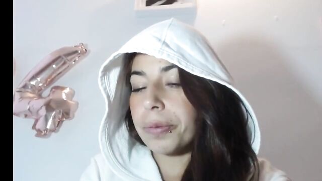 A girl with a tongue fetish fucks with a dildo and spits on it