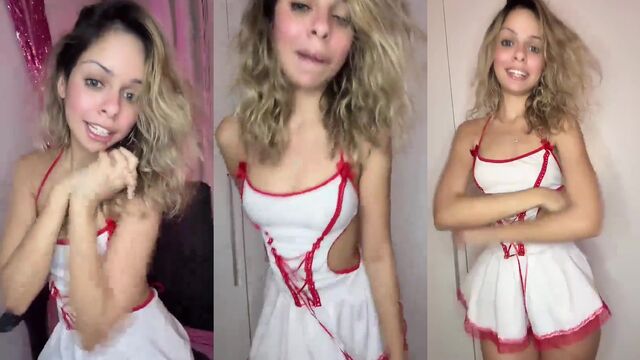 A super cute blonde shows her round ass with great pleasure