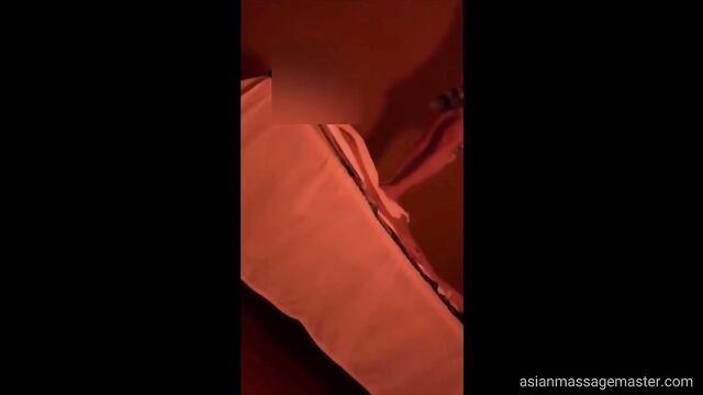 Sensual massage with an Asian beauty in an oily setting
